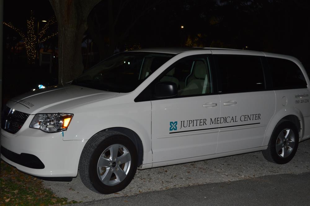 White van with Jupiter Medical Center logo and text 